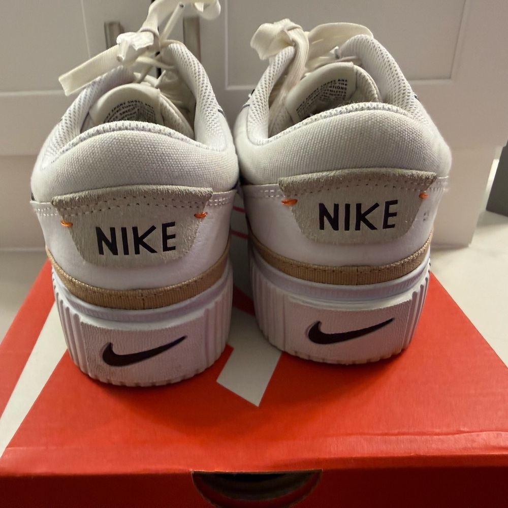 Nike women’s  White and Tan Sneakers